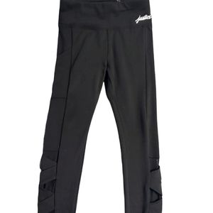 NWOT GIRLS SIZE 7 BLACK PERFORMANCE LEGGINGS WITH MESH DETAIL AND A POCKET